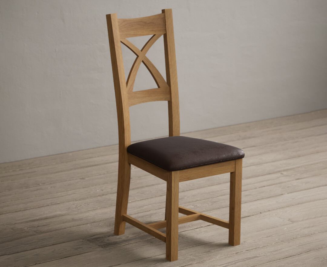 Photo 1 of Natural solid oak x back dining chairs with brown suede seat pad