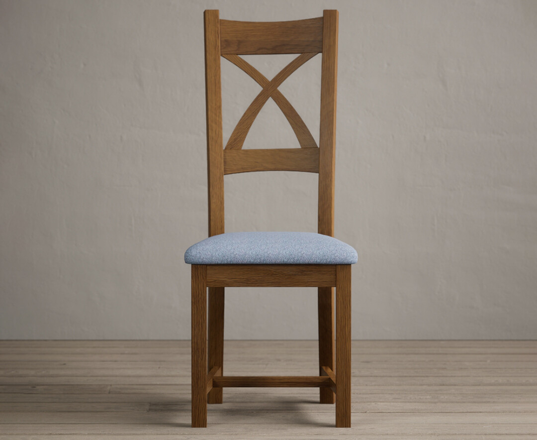 Product photograph of Rustic Solid Oak X Back Dining Chairs With Blue Fabric Seat Pad from Oak Furniture Superstore