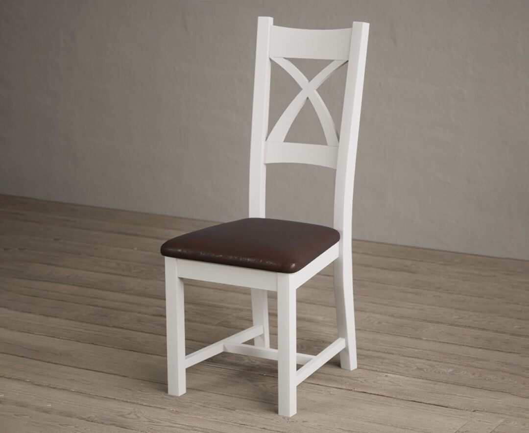 Photo 2 of Painted signal white x back dining chairs with brown suede seat pad