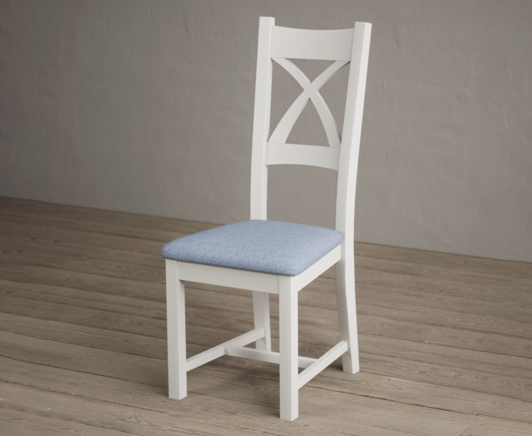 Photo 2 of Painted signal white x back dining chairs with blue fabric seat pad