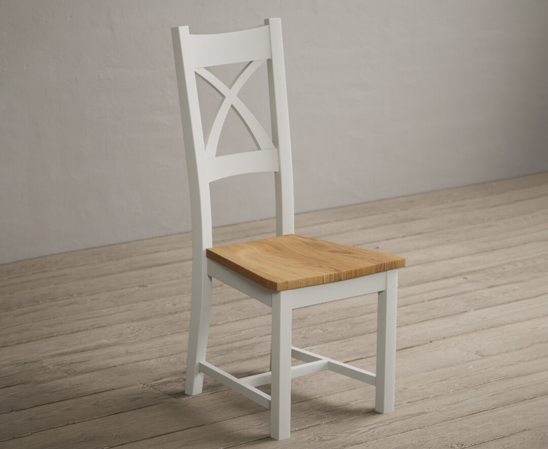 Photo 1 of Painted signal white x back dining chairs with oak seat pad