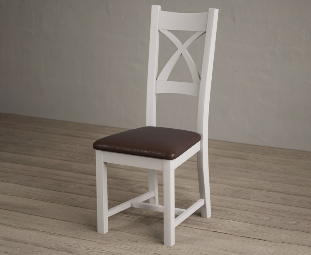 Photo 2 of Painted soft white x back dining chairs with brown suede seat pad