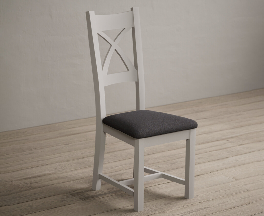 Photo 1 of Painted soft white x back dining chairs with charcoal grey fabric seat pad