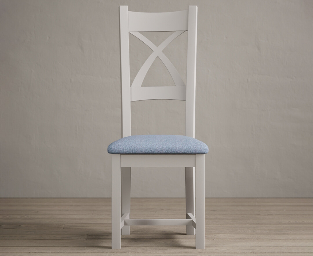 Product photograph of Painted Soft White X Back Dining Chairs With Blue Fabric Seat Pad from Oak Furniture Superstore