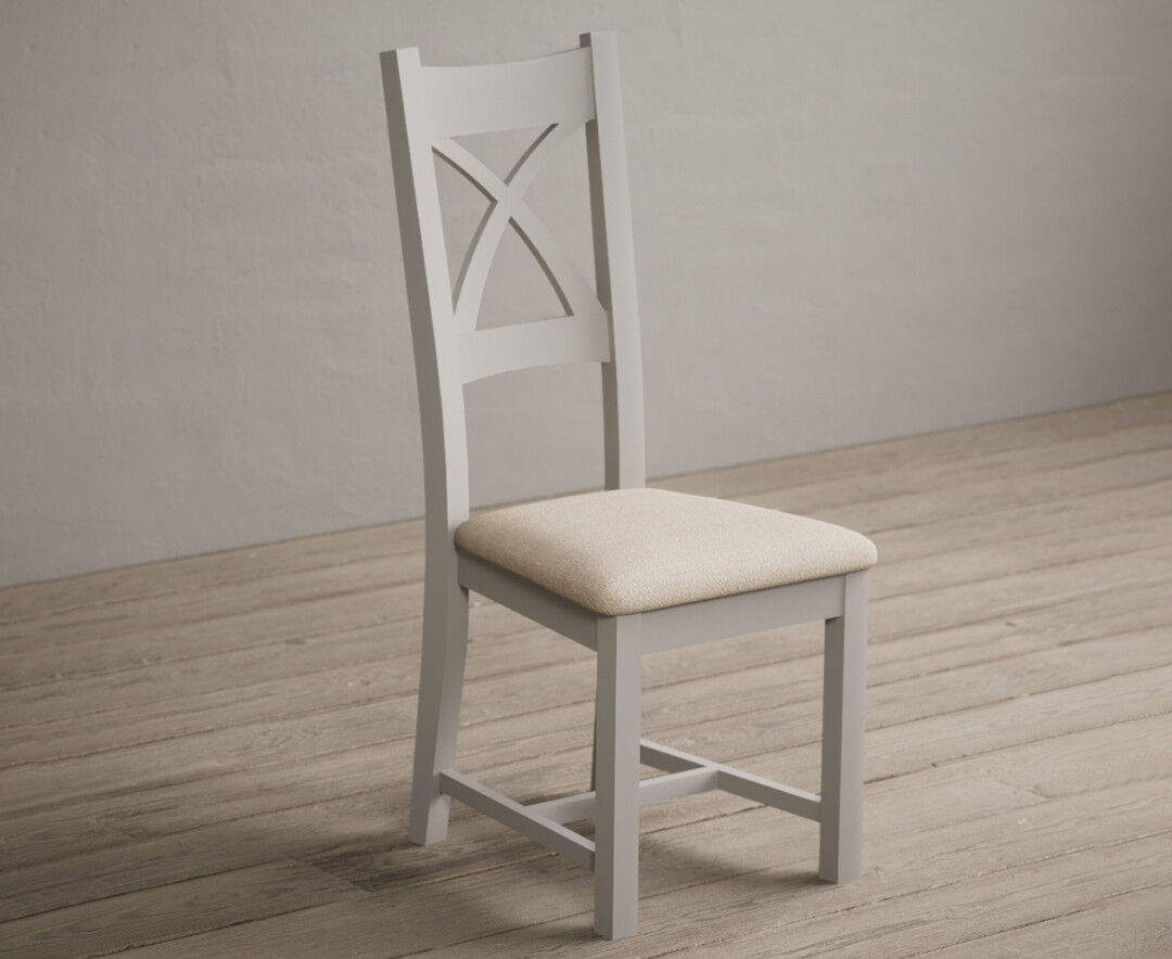 Photo 1 of Painted soft white x back dining chairs with linen seat pad