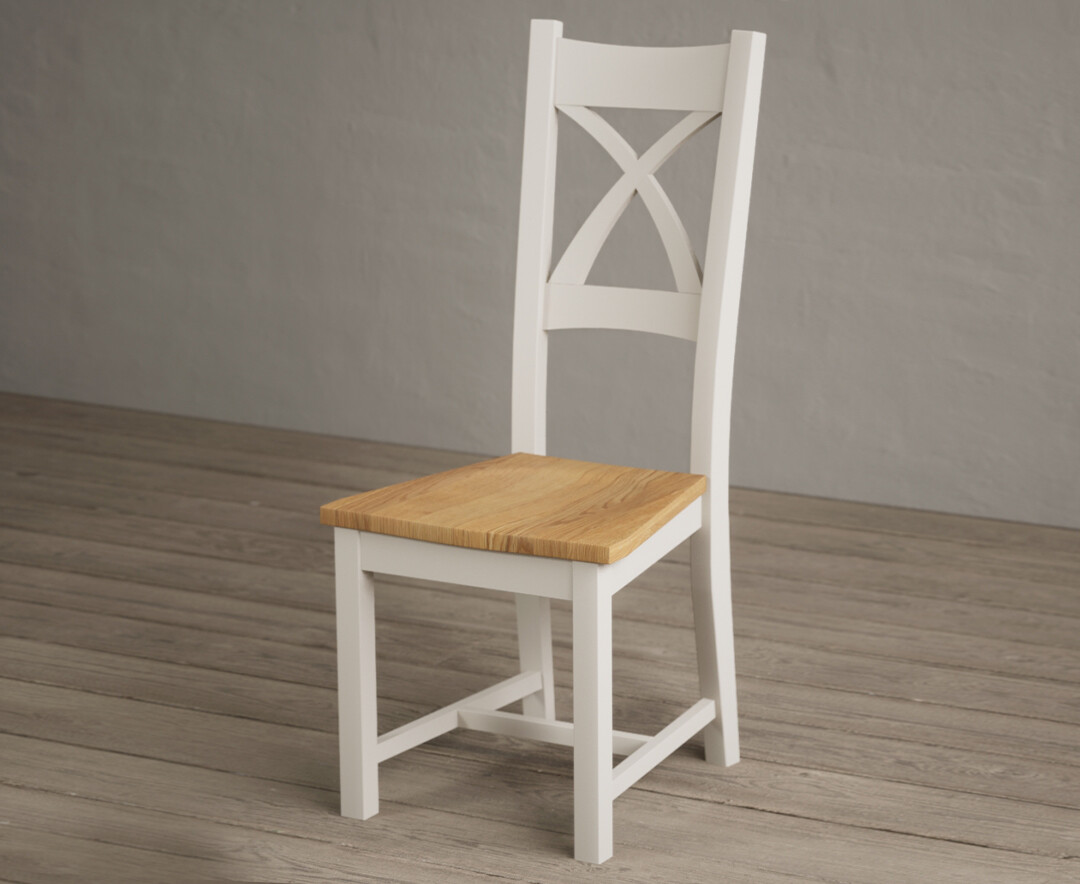 Photo 1 of Painted soft white x back dining chairs with oak seat pad