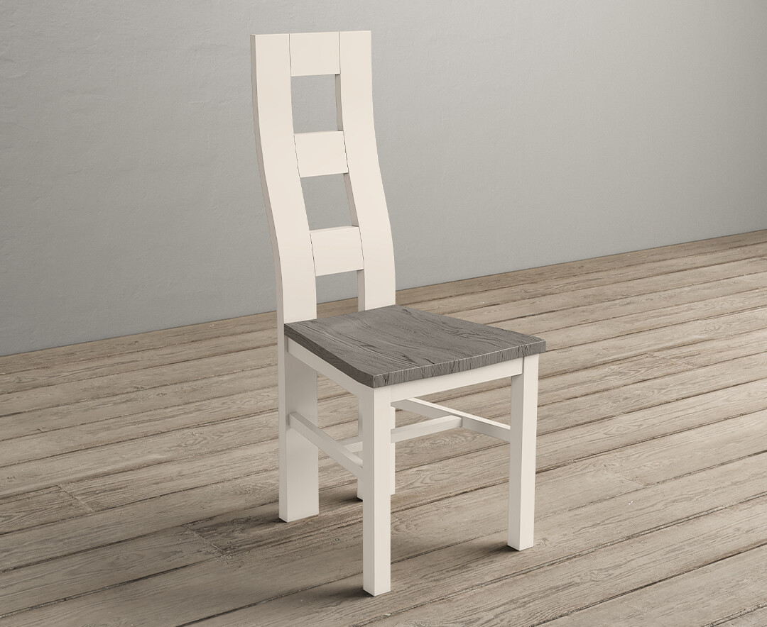Photo 1 of Painted soft white flow back dining chairs with grey oak seat pad