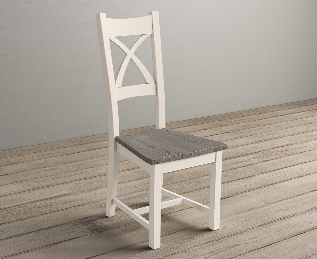 Photo 1 of Painted soft white x back dining chairs with grey oak seat pad