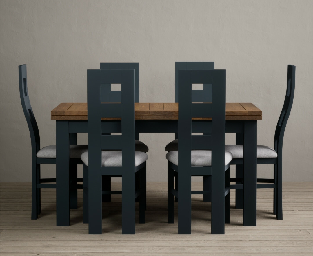 Photo 1 of Hampshire 140cm oak and dark blue extending dining table with 8 blue flow back chairs