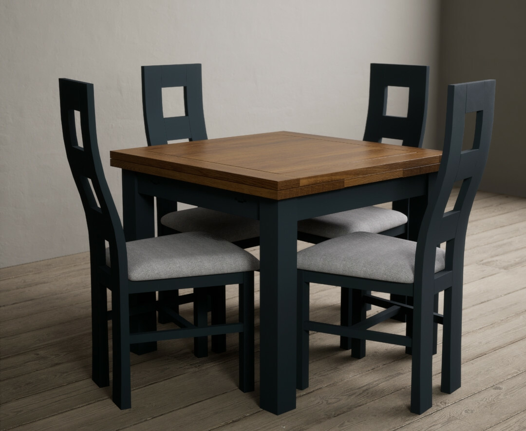 Photo 1 of Buxton 90cm oak and dark blue extending dining table with 6 brown flow back chairs