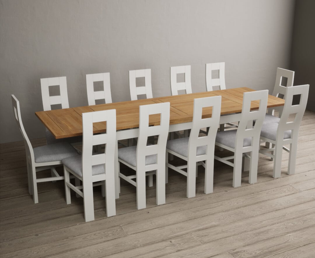 Product photograph of Hampshire 180cm Oak And Chalk White Extending Dining Table With 8 Linen Flow Back Chairs from Oak Furniture Superstore