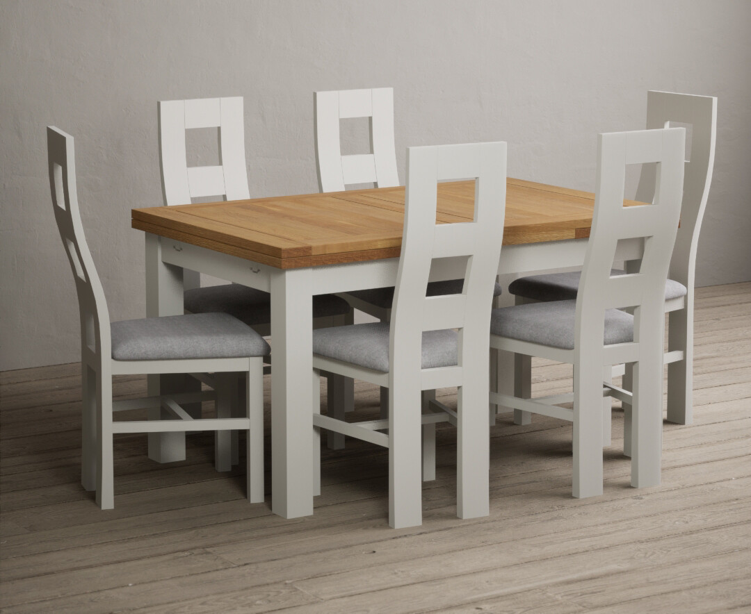 Product photograph of Extending Hampshire 140cm Oak And Signal White Dining Table With 8 Blue Flow Back Chairs from Oak Furniture Superstore