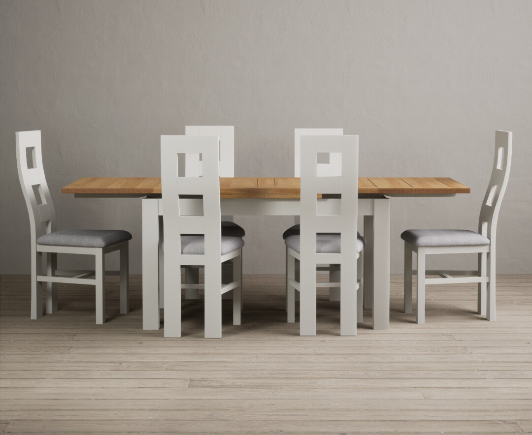 Photo 1 of Extending hampshire 140cm oak and signal white dining table with 8 brown flow back chairs