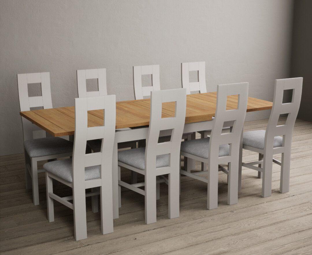 Product photograph of Hampshire 140cm Oak And Soft White Extending Dining Table With 8 Light Grey Flow Back Chairs from Oak Furniture Superstore