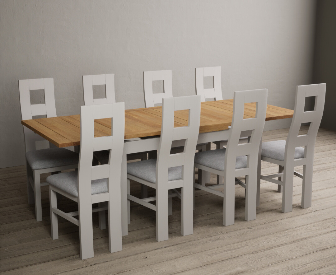 Product photograph of Hampshire 140cm Oak And Soft White Extending Dining Table With 6 Blue Flow Back Chairs from Oak Furniture Superstore