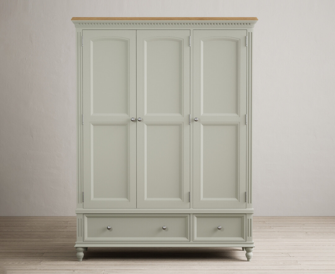 Product photograph of Francis Oak And Soft Green Painted Triple Wardrobe from Oak Furniture Superstore