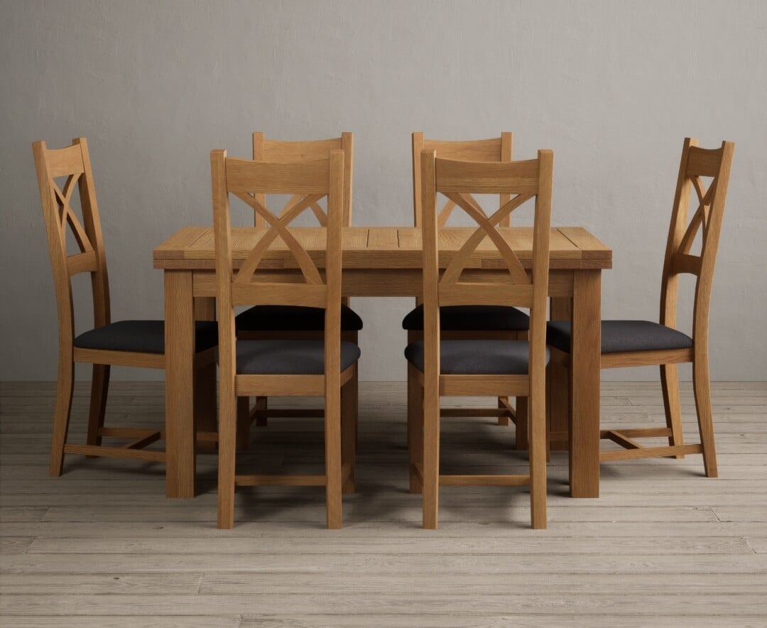 Product photograph of Extending Buxton 140cm Solid Oak Dining Table With 8 Light Grey X Back Chairs from Oak Furniture Superstore