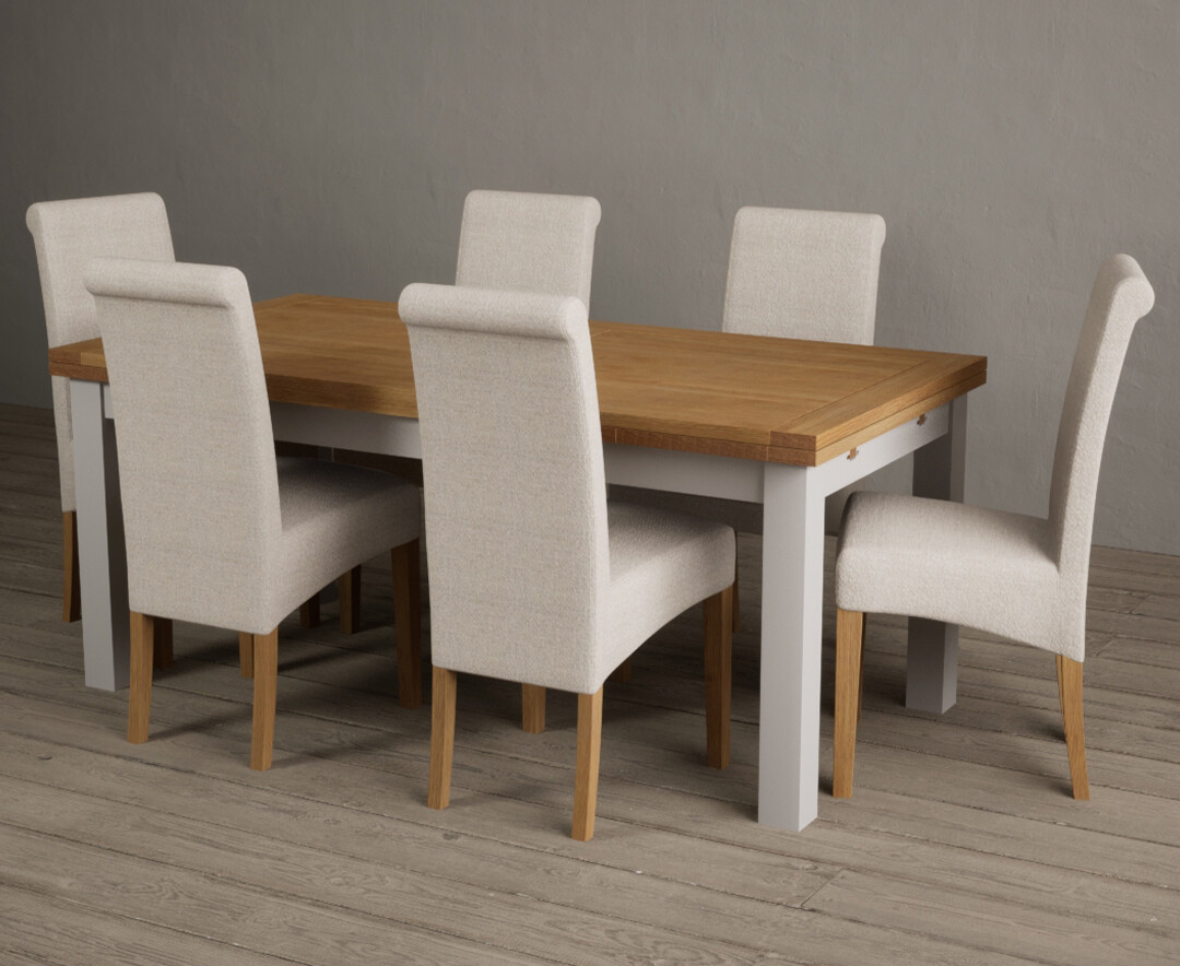 Photo 1 of Extending hampshire 180cm oak and soft white painted dining table scroll with 8 blue back chairs