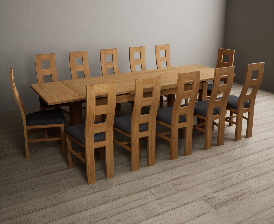 Photo 1 of Extending buxton 180cm solid oak dining table with 12 light grey flow back chairs