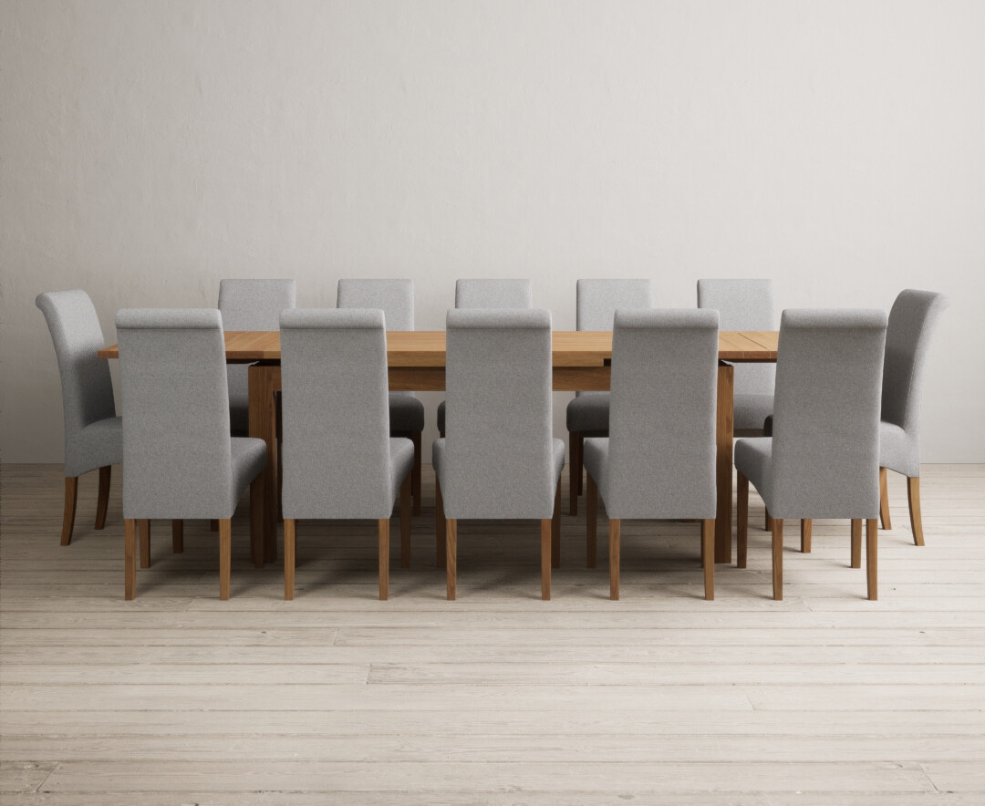 Product photograph of Extending Buxton 180cm Solid Oak Dining Table With 10 Blue Scroll Back Chairs from Oak Furniture Superstore