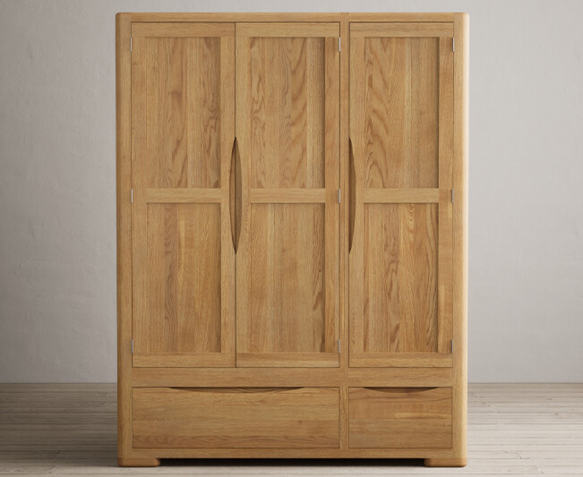 Product photograph of Harper Solid Oak Triple Wardrobe from Oak Furniture Superstore