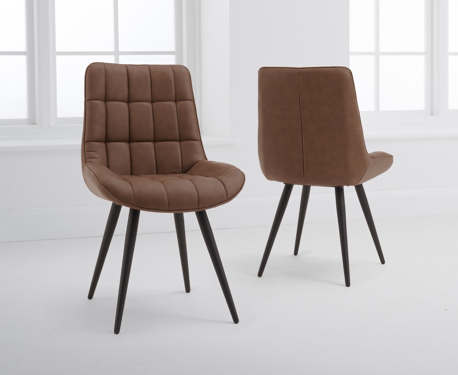 Product photograph of Larson Brown Faux Leather Dining Chairs from Oak Furniture Superstore