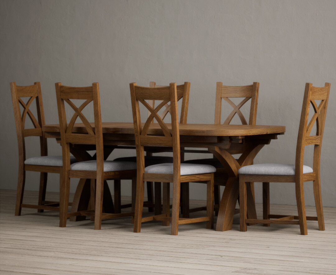 Photo 1 of Olympia 180cm rustic solid oak extending dining table with 12 light grey rustic solid oak x back chairs