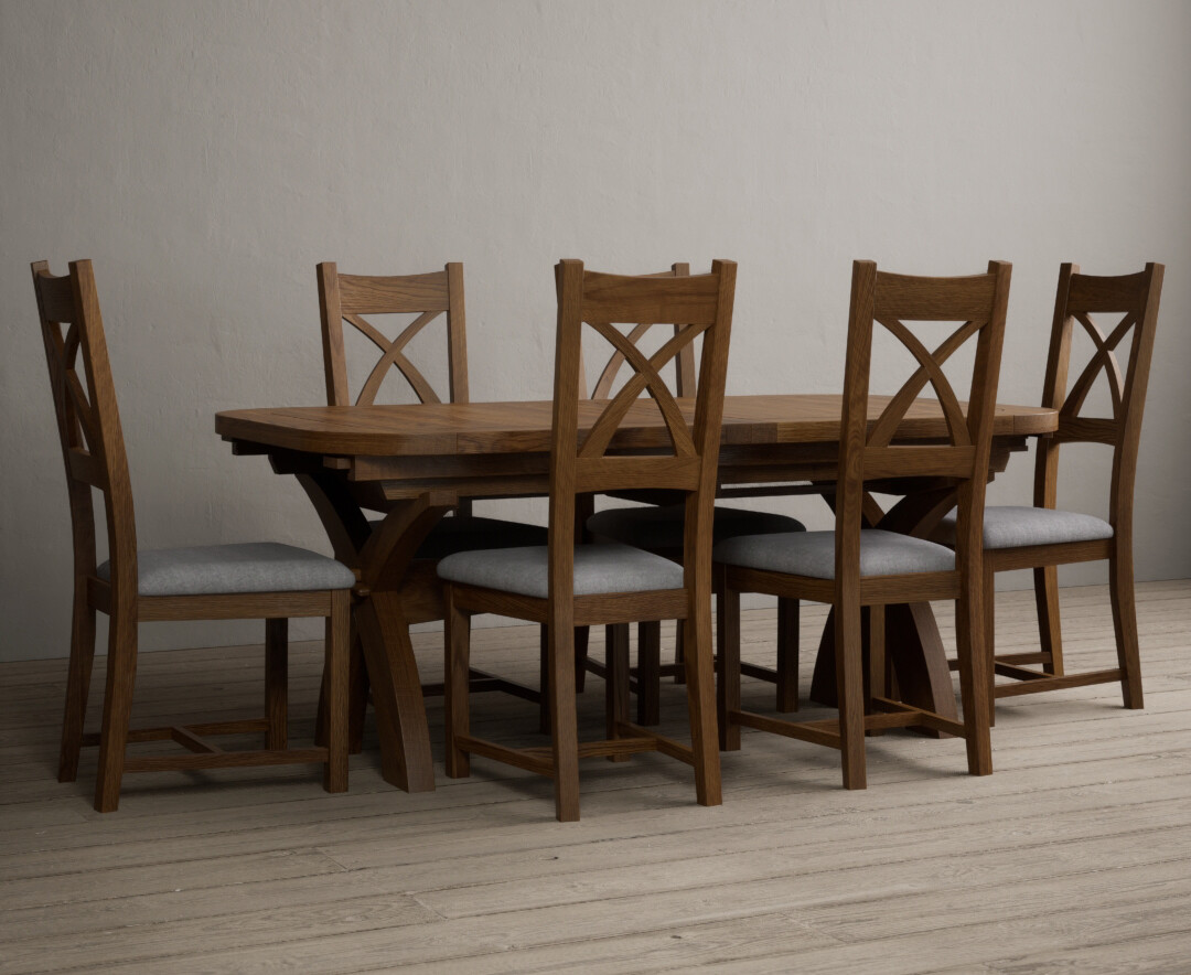 Product photograph of Olympia 180cm Rustic Solid Oak Extending Dining Table With 10 Light Grey Rustic Solid Oak X Back Chairs from Oak Furniture Superstore