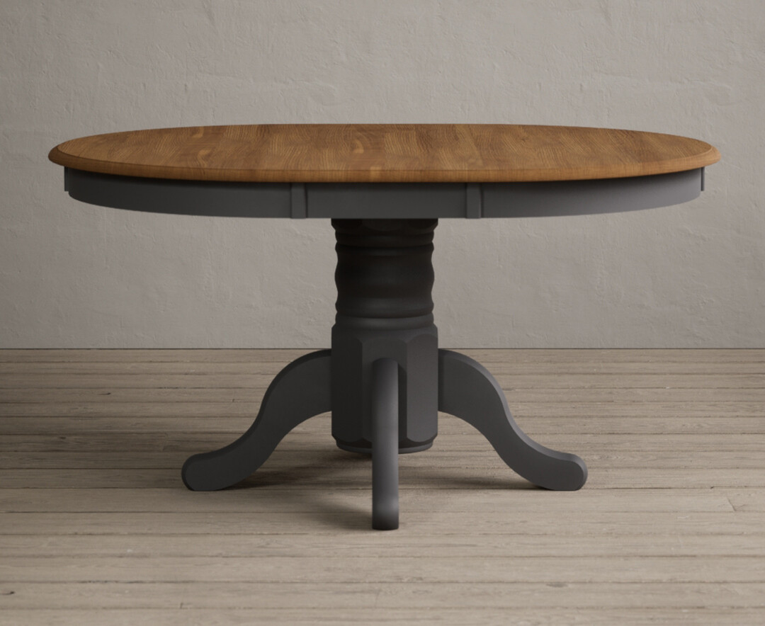 Product photograph of Extending Hertford 100cm - 130cm Oak And Charcoal Grey Painted Pedestal Dining Table from Oak Furniture Superstore