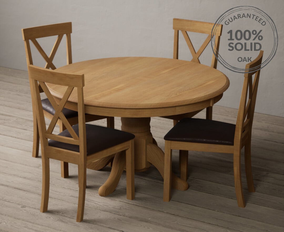 Solid oak round dining table and chairs sale