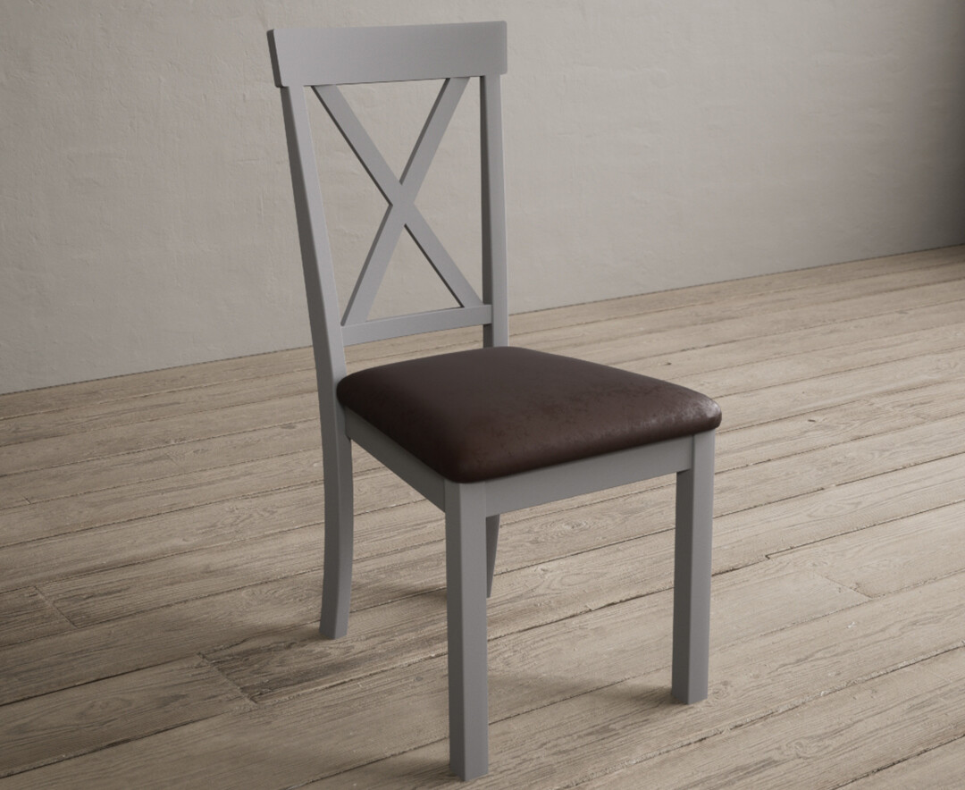 Photo 1 of Hertford light grey dining chairs with brown suede seat pad
