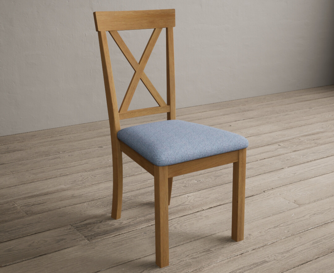 Photo 1 of Hertford solid oak dining chairs with blue fabric seat pad