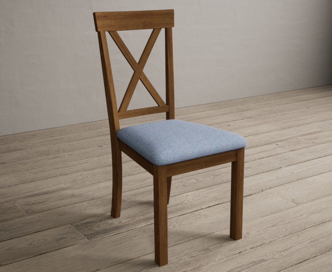 Photo 1 of Hertford rustic oak dining chairs with blue fabric seat pad