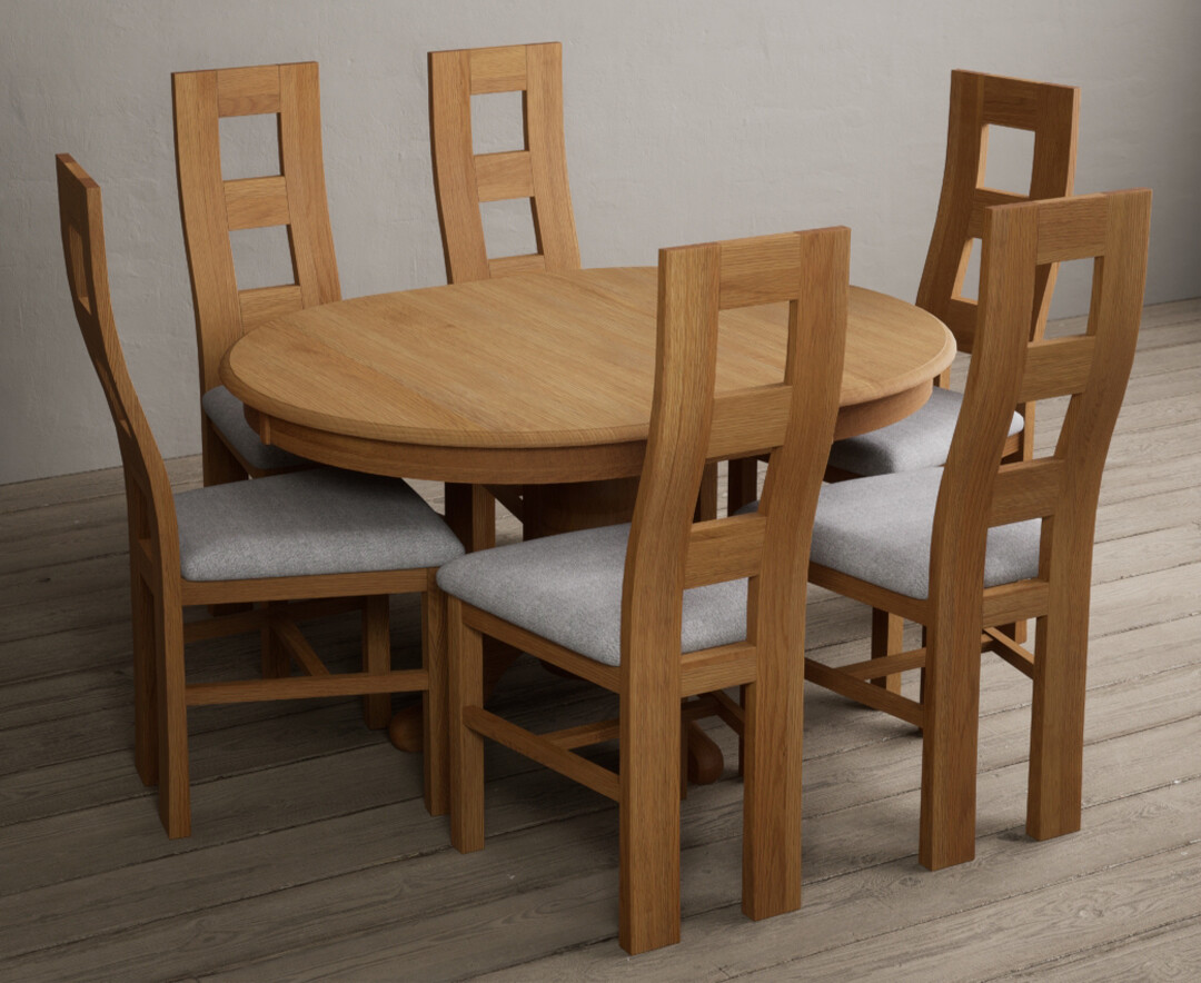 Photo 1 of Extending hertford 100cm - 130cm solid oak pedestal dining table with 4 blue flow back chairs