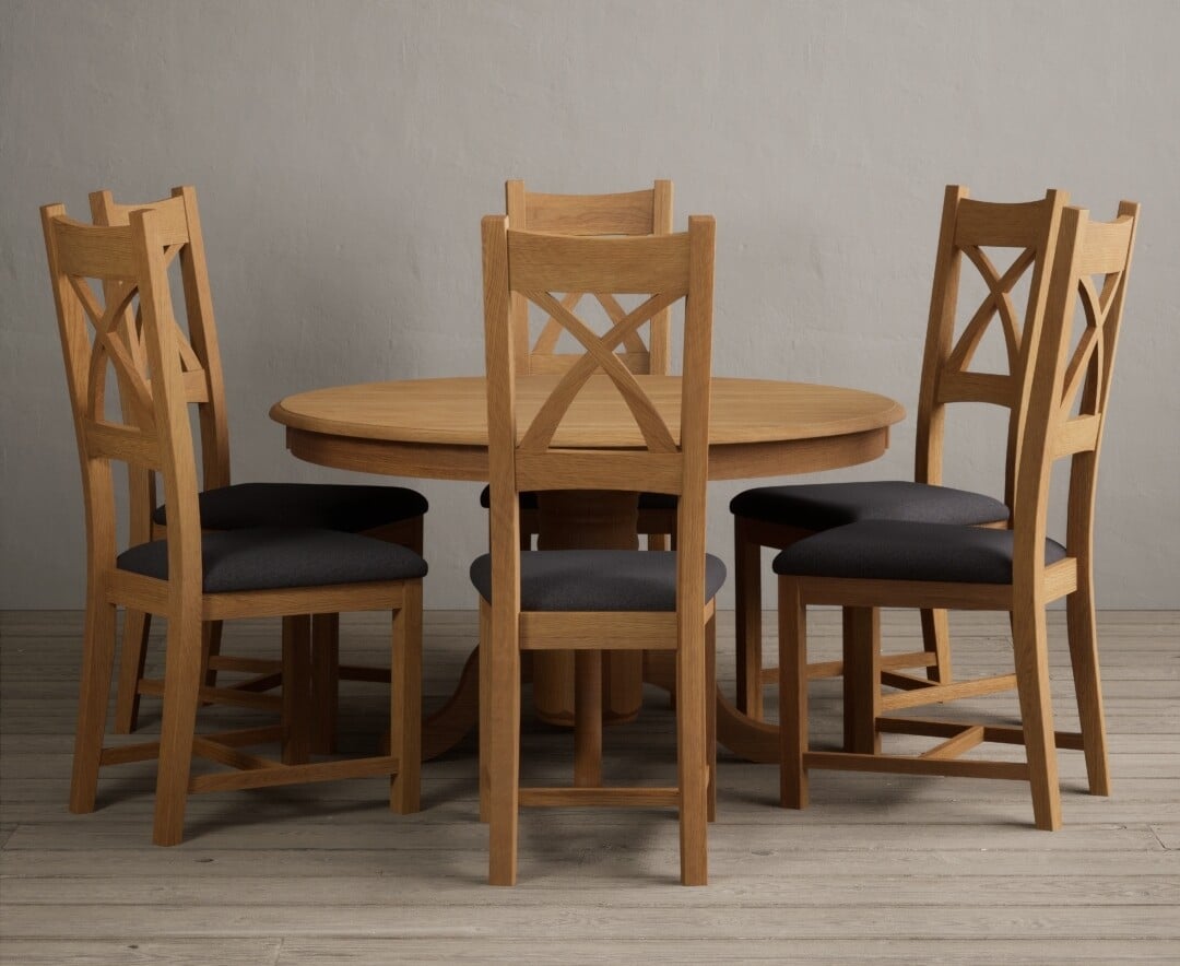 Product photograph of Hertford 120cm Fixed Top Solid Oak Round Pedestal Table With 6 Charcoal Grey X Back Chairs from Oak Furniture Superstore