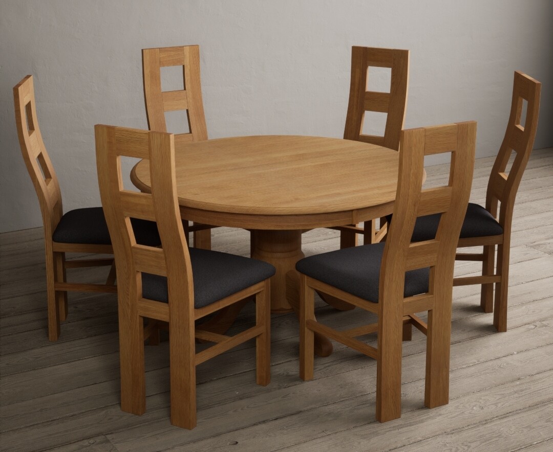 Photo 1 of Hertford 120cm fixed top solid oak round pedestal table with 4 brown flow back chairs
