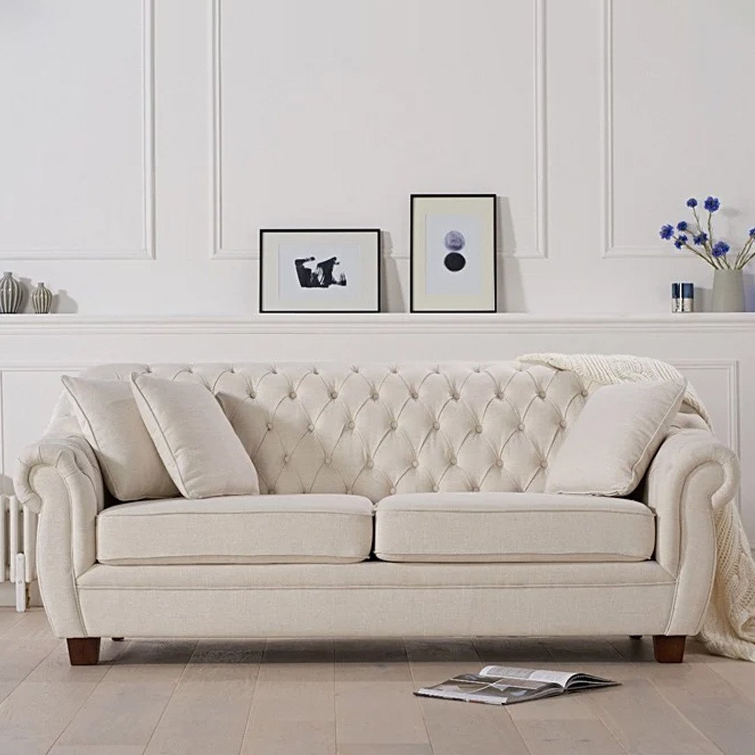 Product photograph of Eva Chesterfield Ivory Linen Fabric Three-seater Sofa from Oak Furniture Superstore