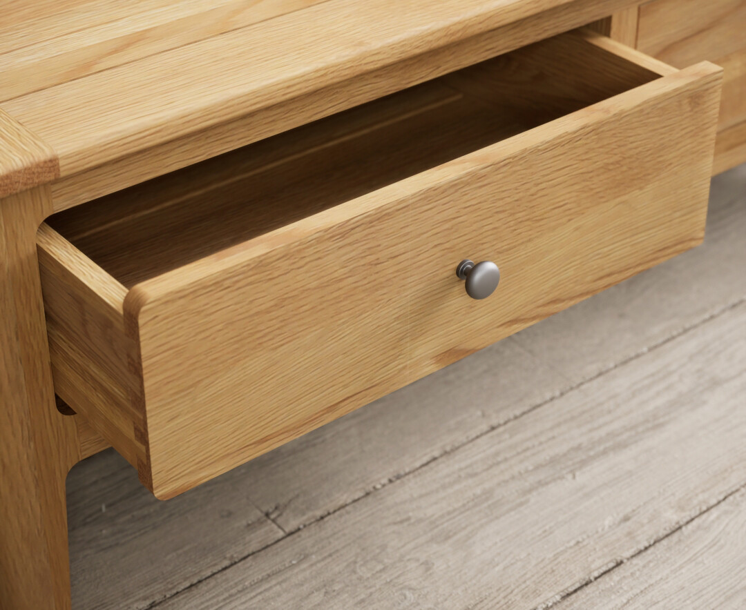 Product photograph of Loxton Solid Oak 4 Drawer Coffee Table from Oak Furniture Superstore