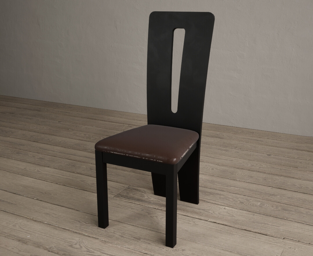 Photo 1 of Lucca black dining chairs with brown suede seat pad