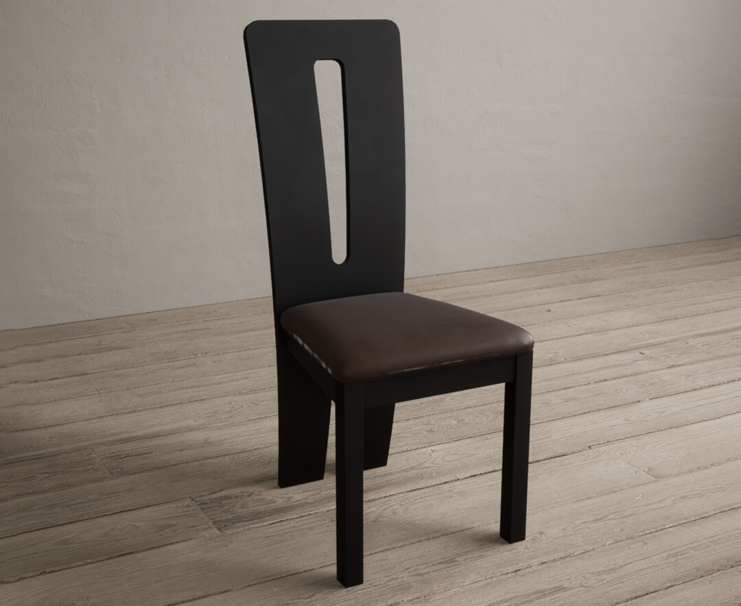 Photo 2 of Lucca black dining chairs with brown suede seat pad