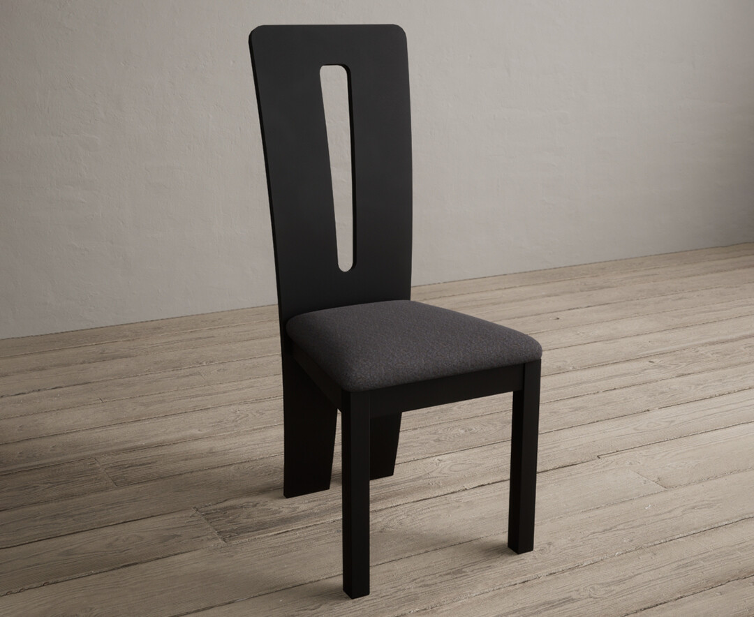 Photo 1 of Lucca black dining chairs with charcoal grey fabric seat pad
