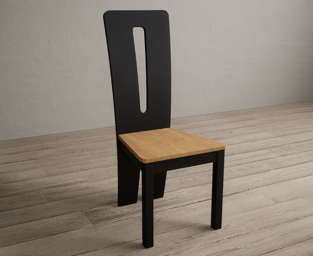 Photo 1 of Lucca black dining chairs with oak seat pad