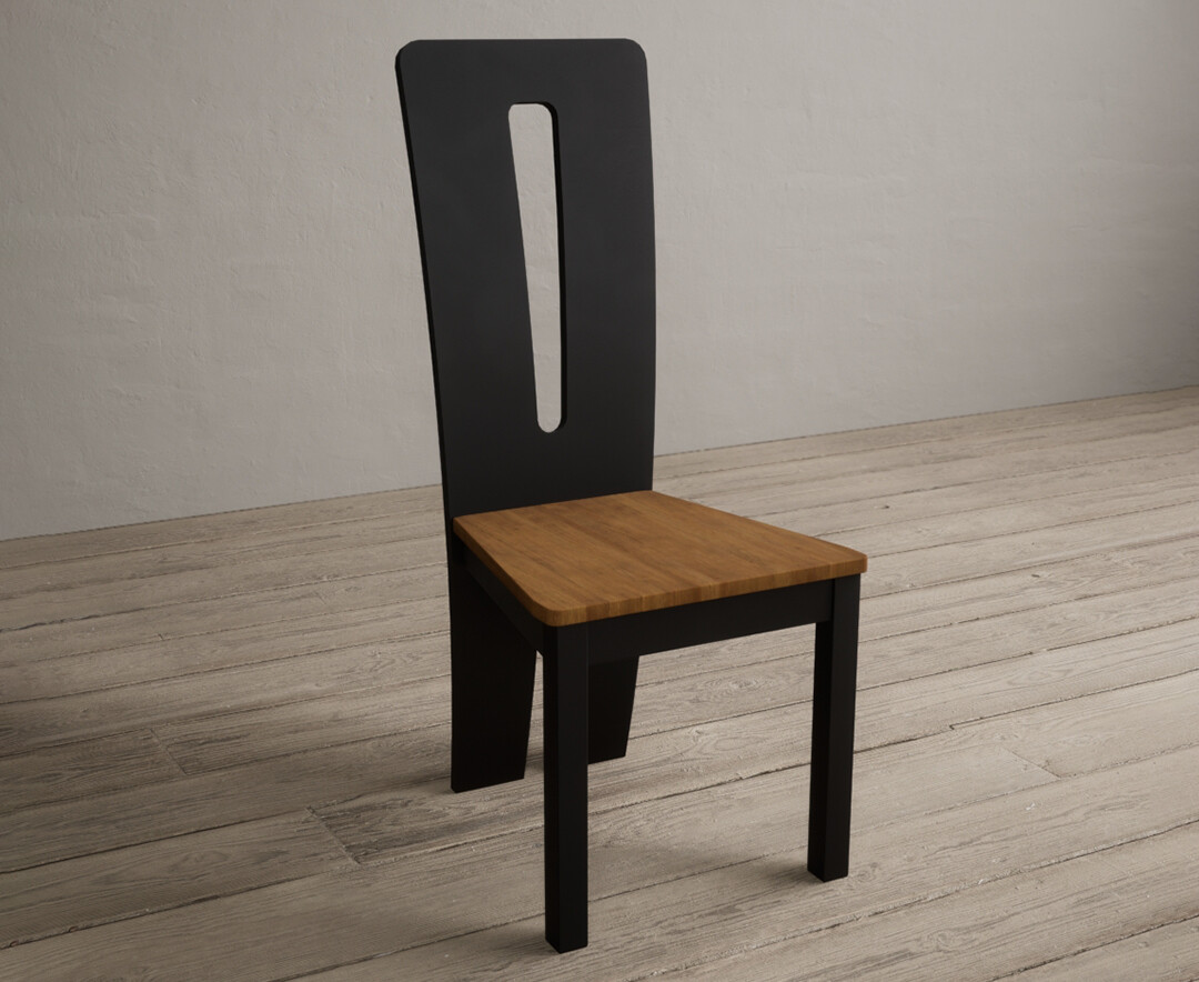 Photo 1 of Lucca black dining chairs with rustic oak seat pad