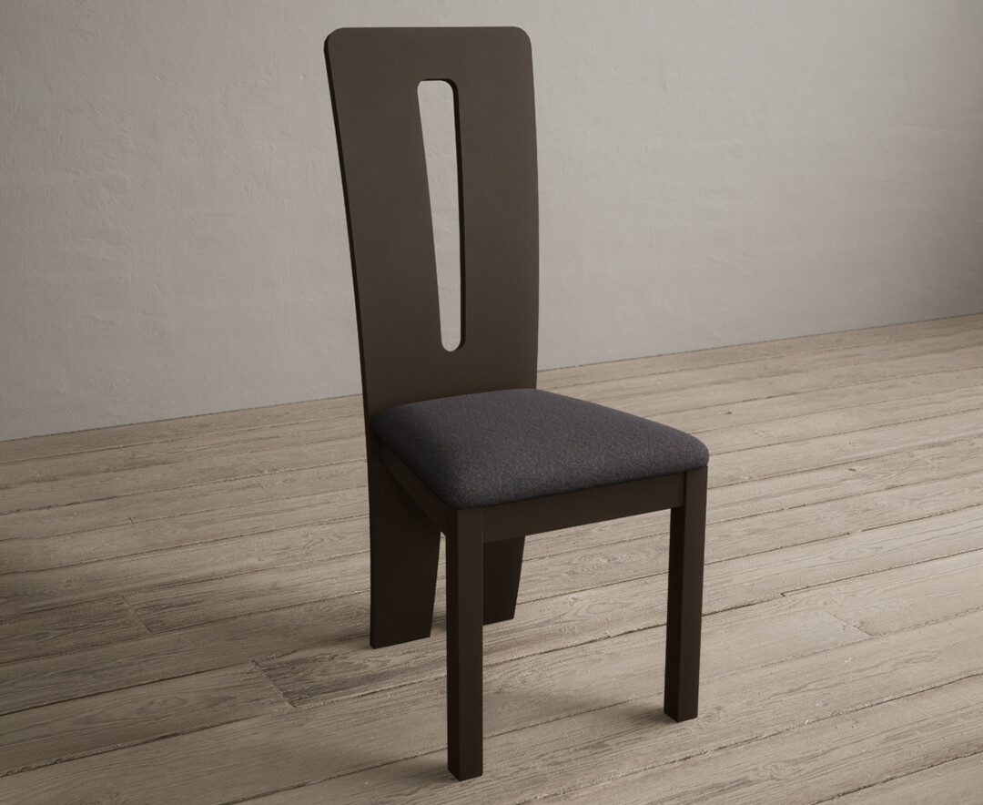 Photo 1 of Lucca brown dining chairs with charcoal grey fabric seat pad