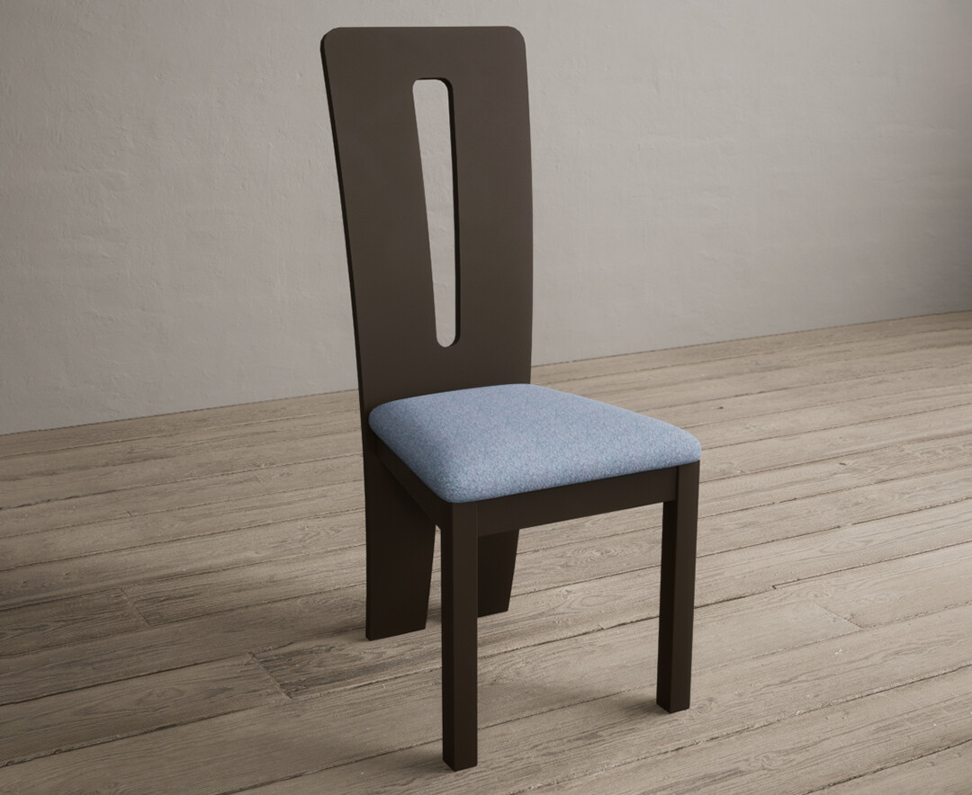 Photo 1 of Lucca brown dining chairs with blue fabric seat pad
