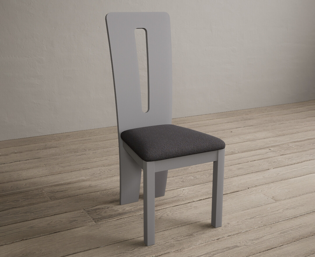 Photo 1 of Lucca light grey dining chairs with charcoal grey fabric seat pad