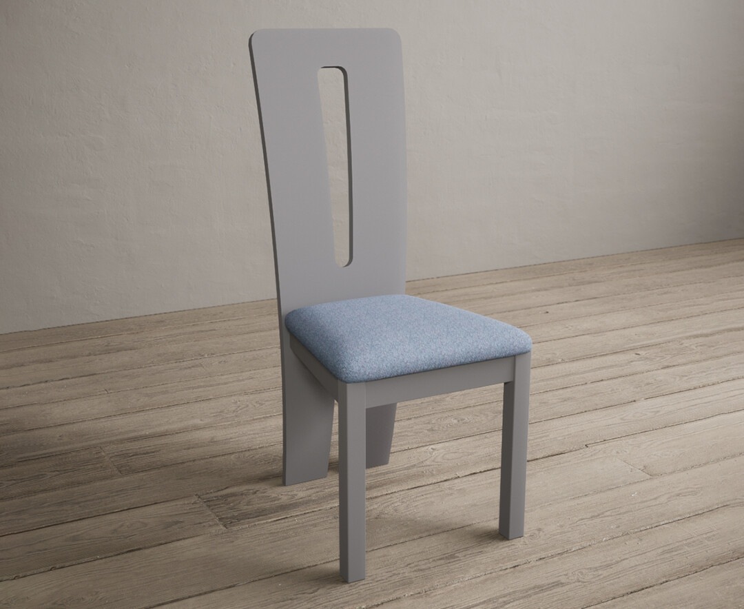Photo 1 of Lucca light grey dining chairs with blue fabric seat pad