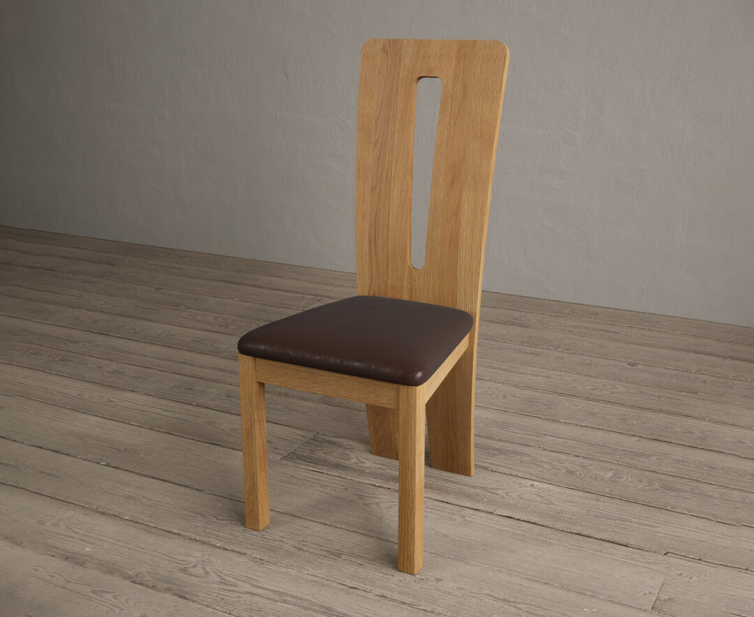 Photo 2 of Lucca solid oak dining chairs with brown suede seat pad