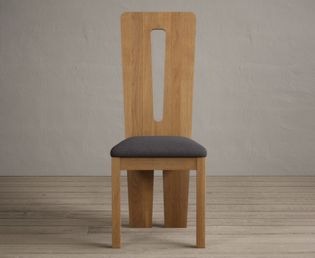 Product photograph of Lucca Solid Oak Dining Chairs With Charcoal Grey Fabric Seat Pad from Oak Furniture Superstore