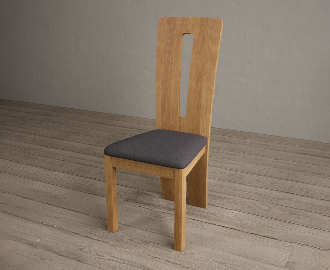 Photo 2 of Lucca solid oak dining chairs with charcoal grey fabric seat pad